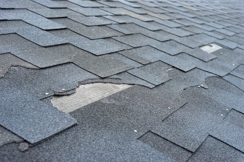 Missing shingles on damaged roof | BLC Roofing Akron OH